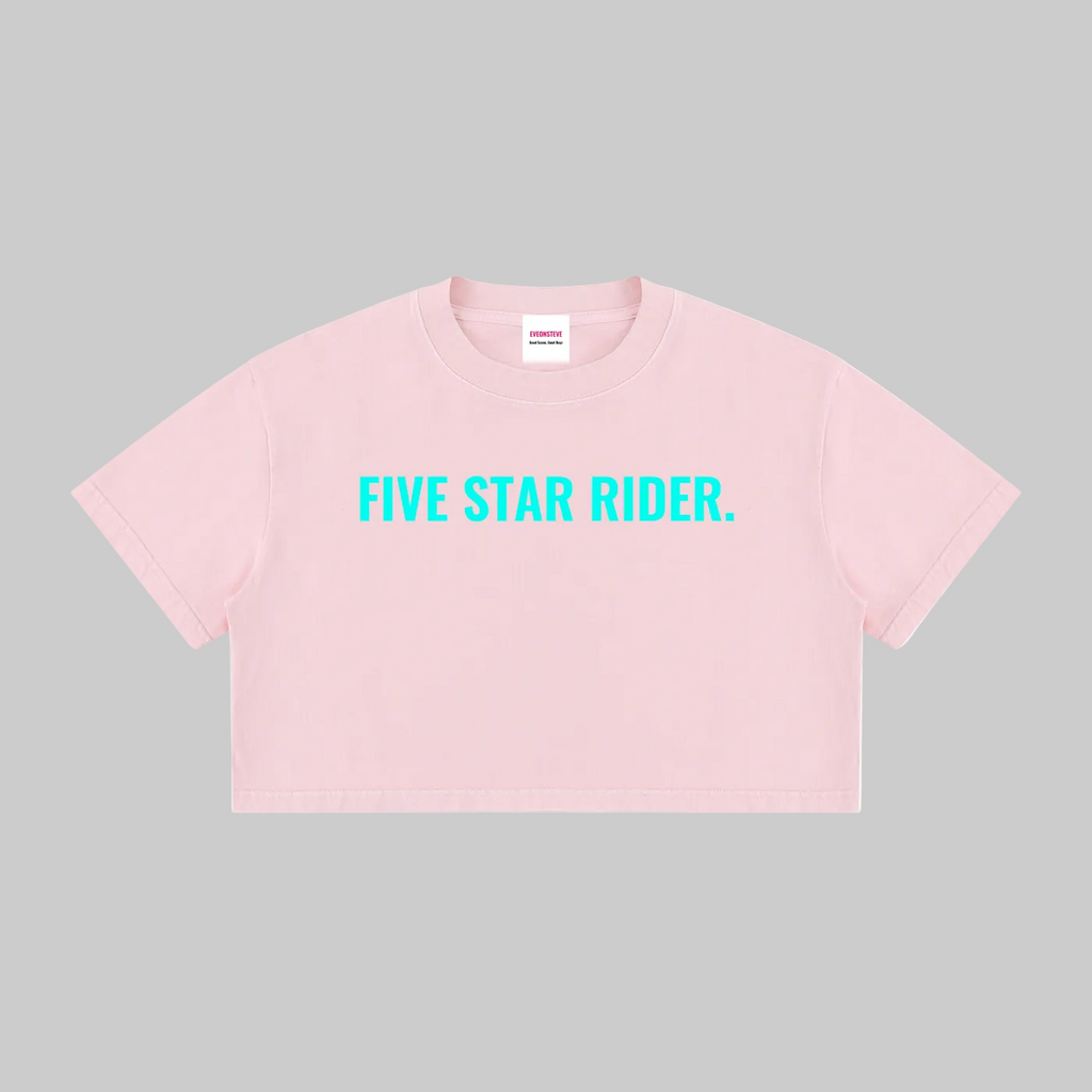 A light pink cropped short-sleeve t-shirt with 'FIVE STAR RIDER.' printed in bright cyan across the chest, displayed flat against a solid white background.